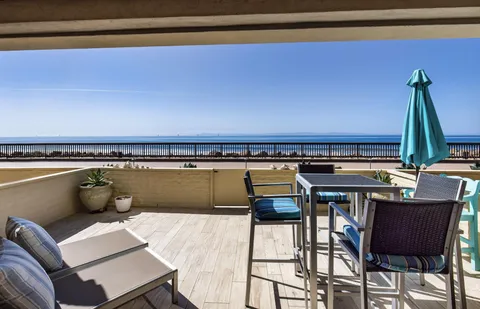 a view of a terrace with chairs
