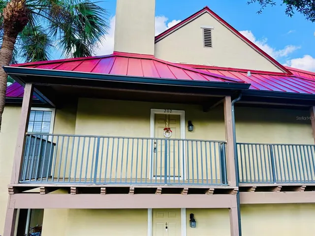 a view of swimming pool with seating area