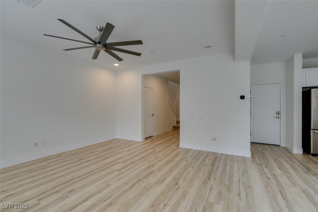 2617 Courgette Way Henderson, NV 89044 - Photo 14 of 52 New luxury water proof flooring downstairs and in wet area