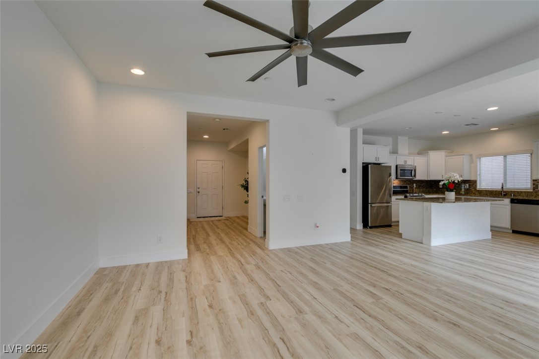 2617 Courgette Way Henderson, NV 89044 - Photo 15 of 52 New water proof flooring downstairs and in wet area
