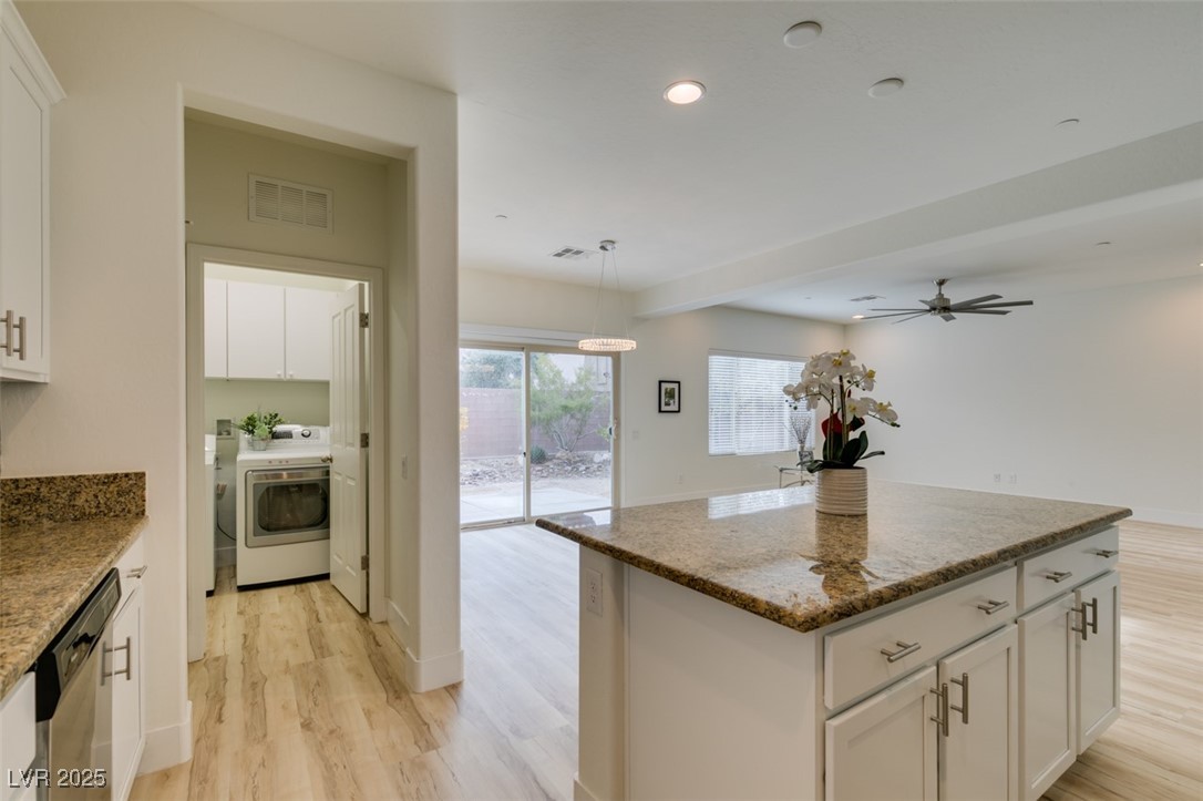 2617 Courgette Way Henderson, NV 89044 - Photo 31 of 52 Laundry room is located downstairs. Cook while doing the laundry and take advantage of time!