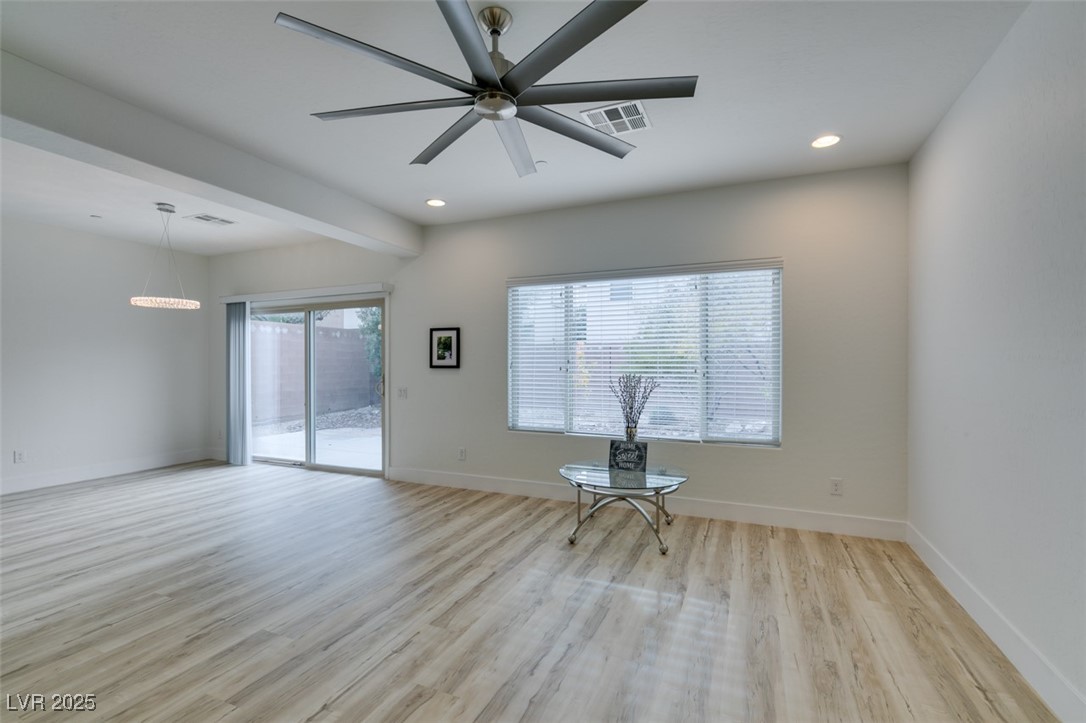 2617 Courgette Way Henderson, NV 89044 - Photo 8 of 52 View of living room and dining area with new luxury water proof flooring