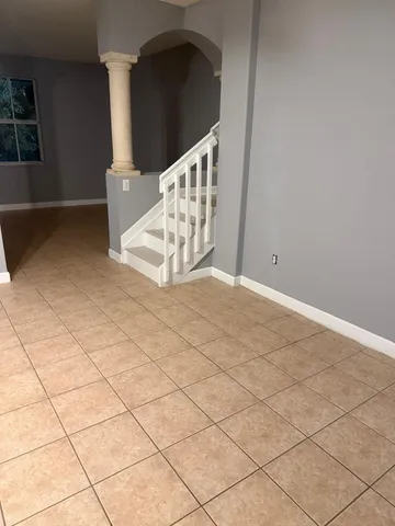 a view of an entryway with staircase