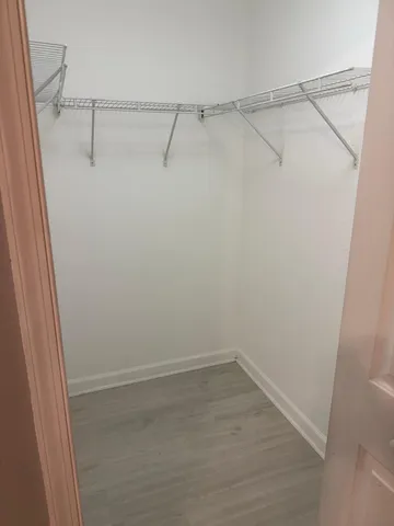 a view of a room with racks on the wall