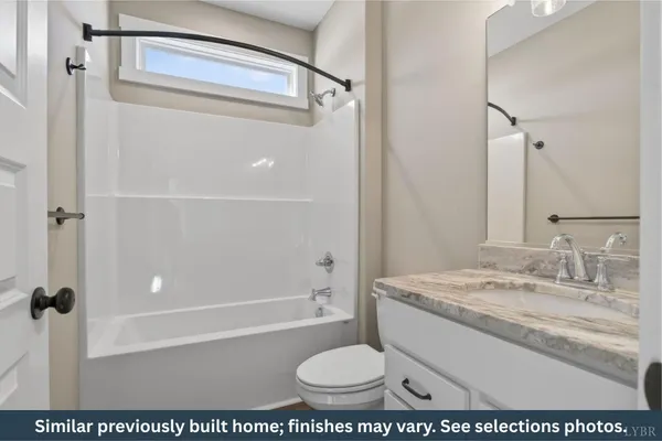 a picture of a bathroom with a sink