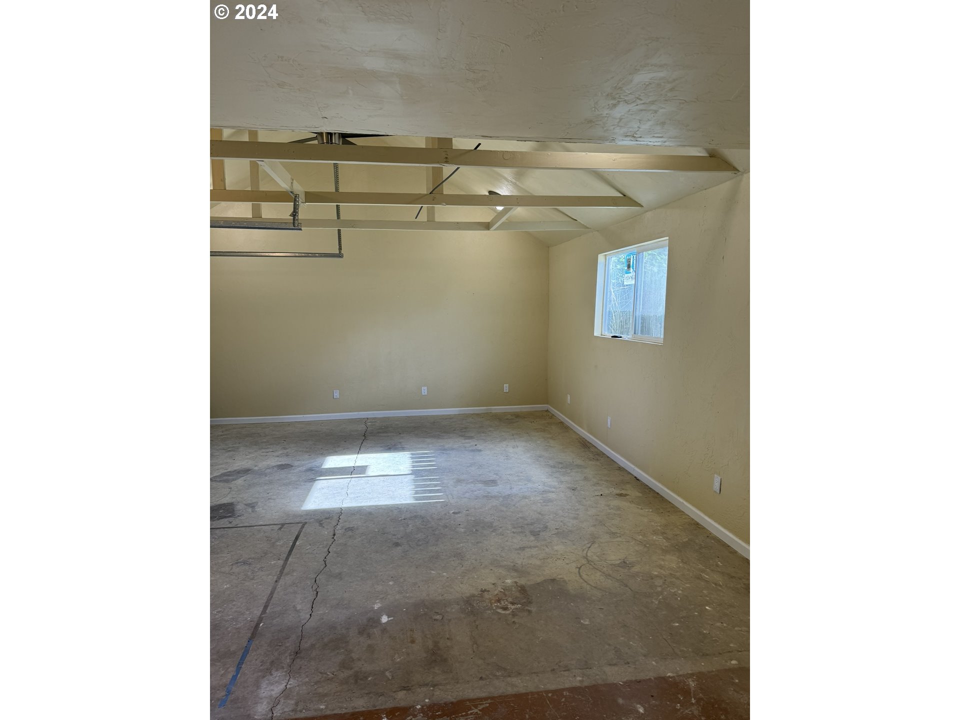 395 Irving Road Eugene, OR 97404 - Photo 36 of 37 a view of a room with racks on the wall