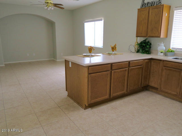 10442 East Butte Street Apache Junction, AZ 85120 - Photo 14 of 49 Kitchen & Family Room
