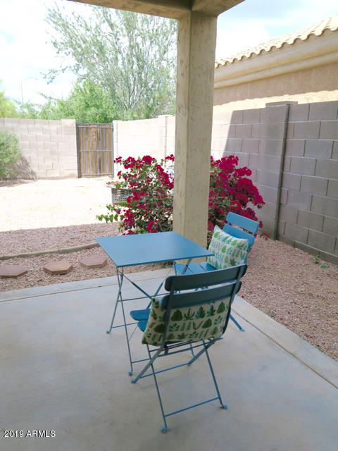 10442 East Butte Street Apache Junction, AZ 85120 - Photo 16 of 49 a outdoor view with a seating space