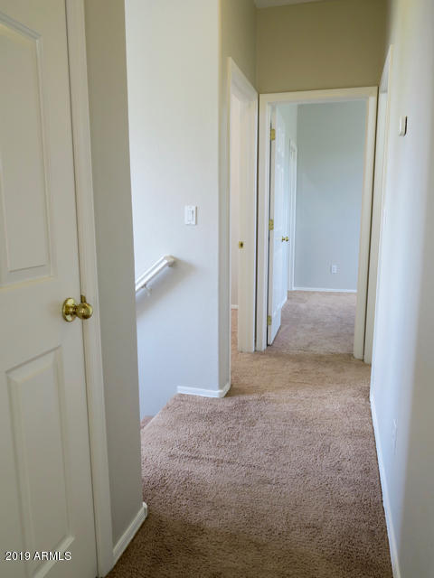 10442 East Butte Street Apache Junction, AZ 85120 - Photo 28 of 49 Hallway to Bedrooms & Bath