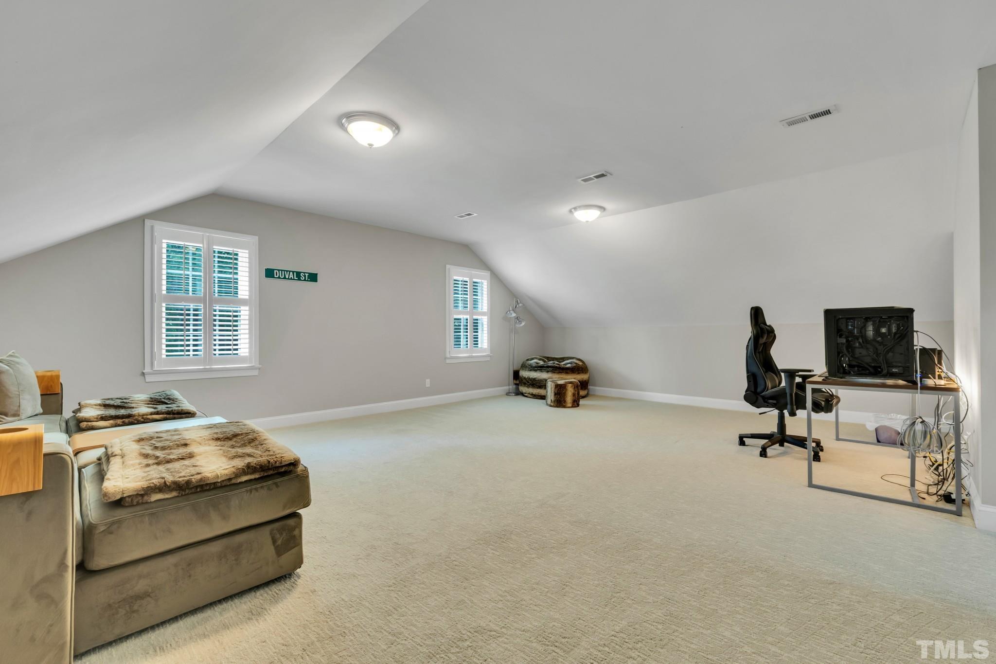 1617 Hunting Ridge Road Raleigh, NC 27615 - Photo 18 of 31 a bedroom with furniture and a window