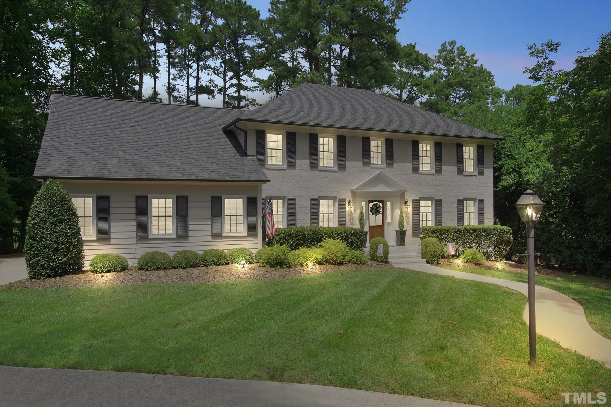 1617 Hunting Ridge Road Raleigh, NC 27615 - Photo 31 of 31 a front view of a house with a yard