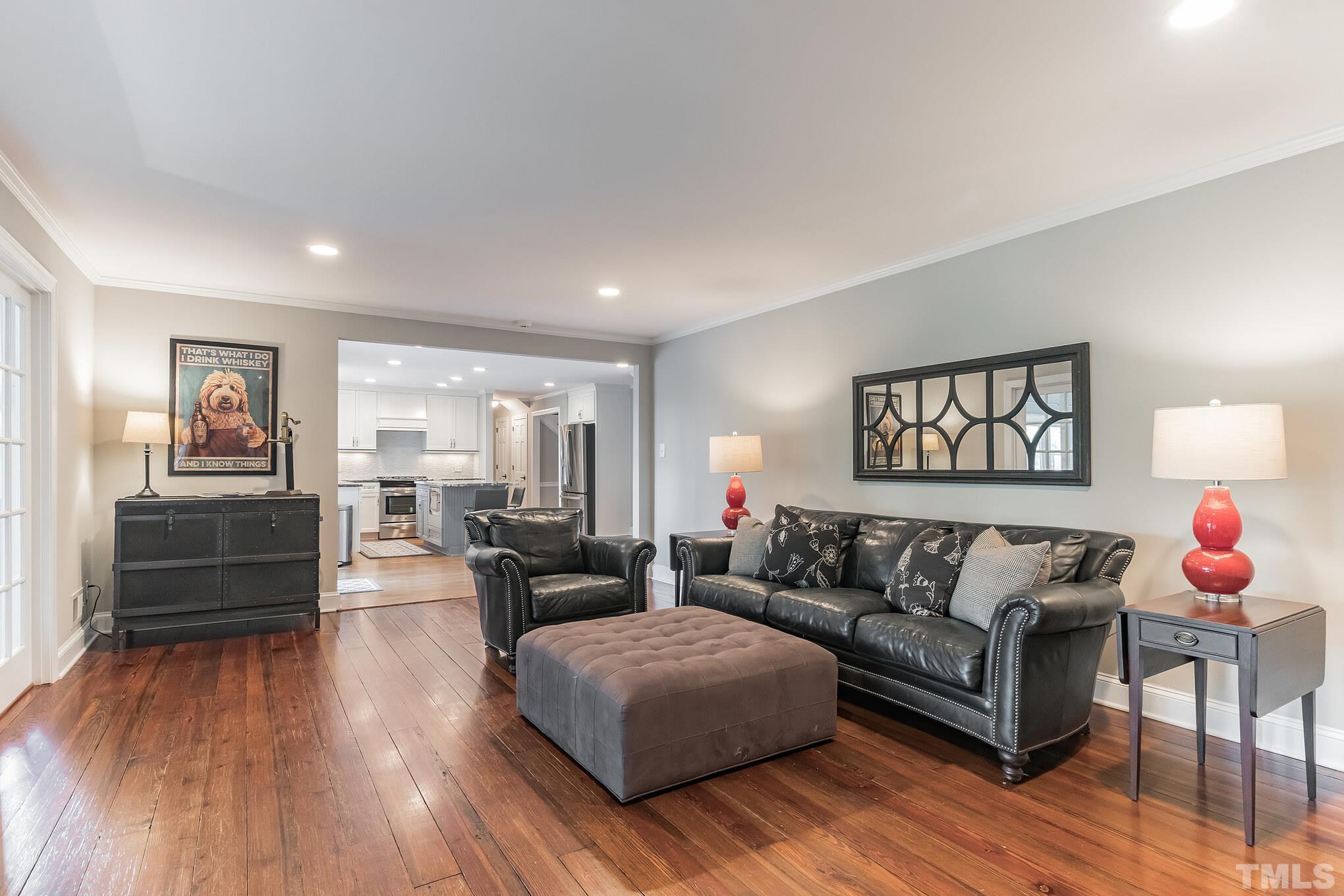 1617 Hunting Ridge Road Raleigh, NC 27615 - Photo 6 of 31 a living room with furniture and wooden floor