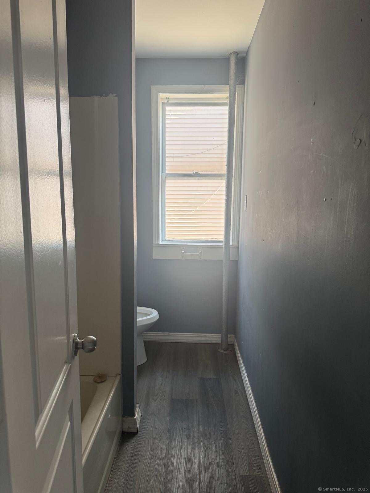 146 George Street, Unit 2 Bridgeport, CT 06604 - Photo 3 of 12 a bathroom with a granite countertop toilet