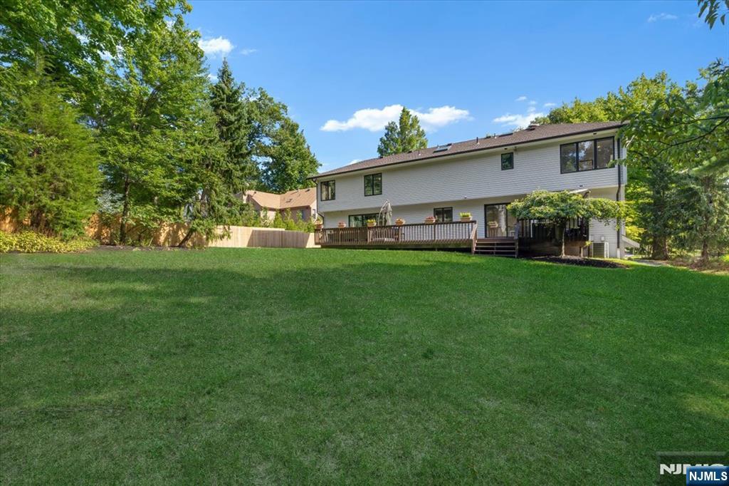 3 Forest Road Tenafly, NJ 07670 - Photo 45 of 50 a view of a house with a yard and sitting area