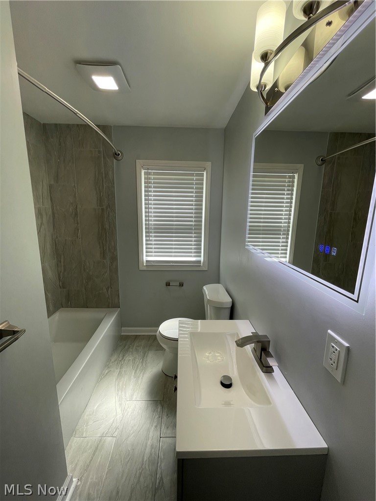 14516 Rockside Road Maple Heights, OH 44137 - Photo 8 of 30 1st floor bathroom with anti-fog led vanity mirror