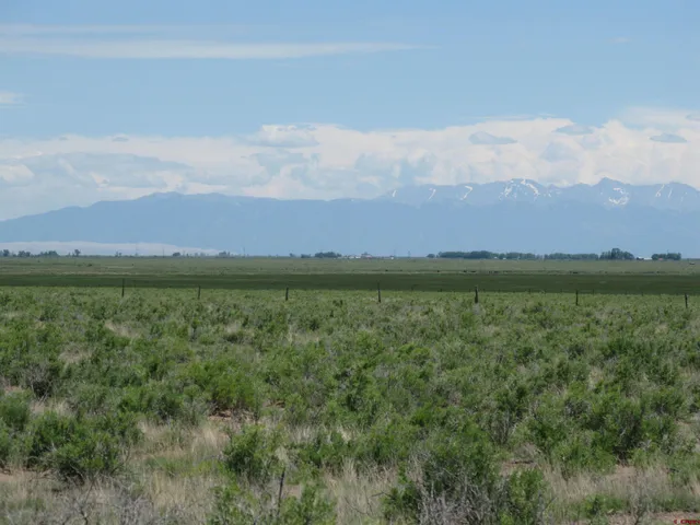 a view of lake with mountain