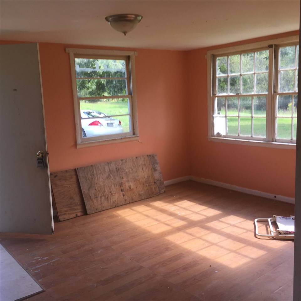 120 Fauver Mine Road Raphine, VA 24472 - Photo 8 of 13 a view of an empty room with a window