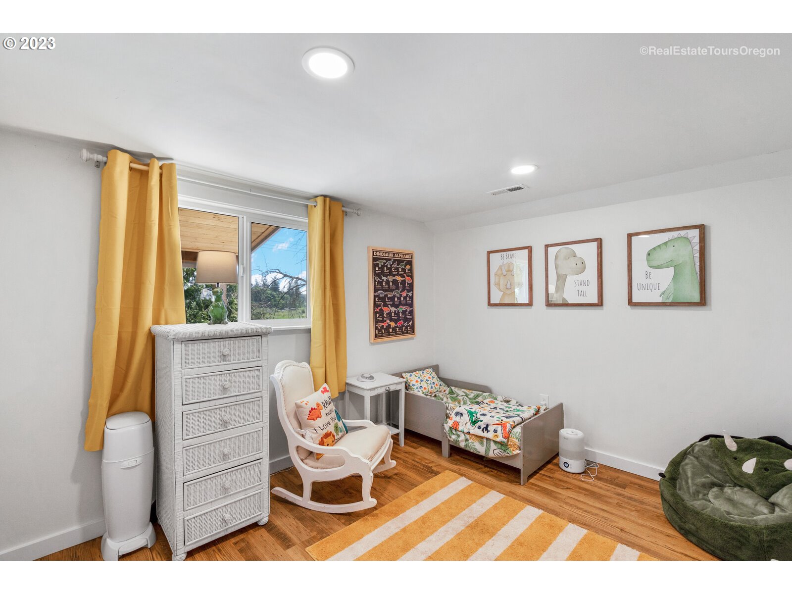 6970 South Knights Bridge Road Canby, OR 97013 - Photo 18 of 32 a bedroom with furniture and a window