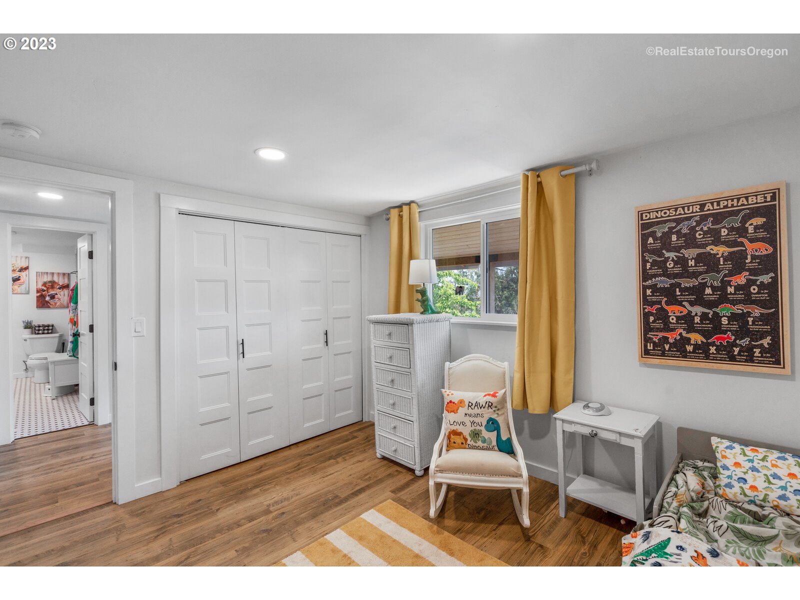 6970 South Knights Bridge Road Canby, OR 97013 - Photo 19 of 32 a bedroom with furniture and a window