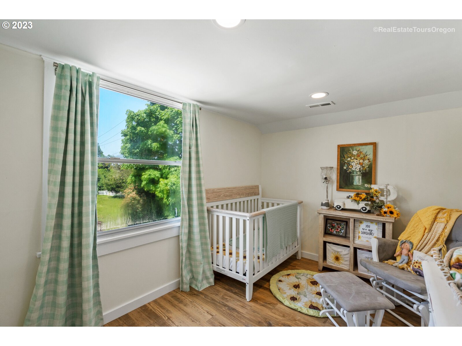 6970 South Knights Bridge Road Canby, OR 97013 - Photo 20 of 32 a bedroom with furniture and a window