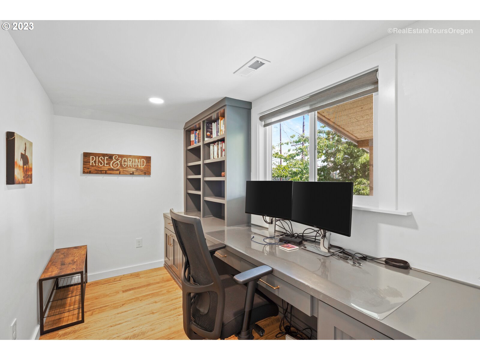 6970 South Knights Bridge Road Canby, OR 97013 - Photo 21 of 32 a view of a workspace with furniture and a window