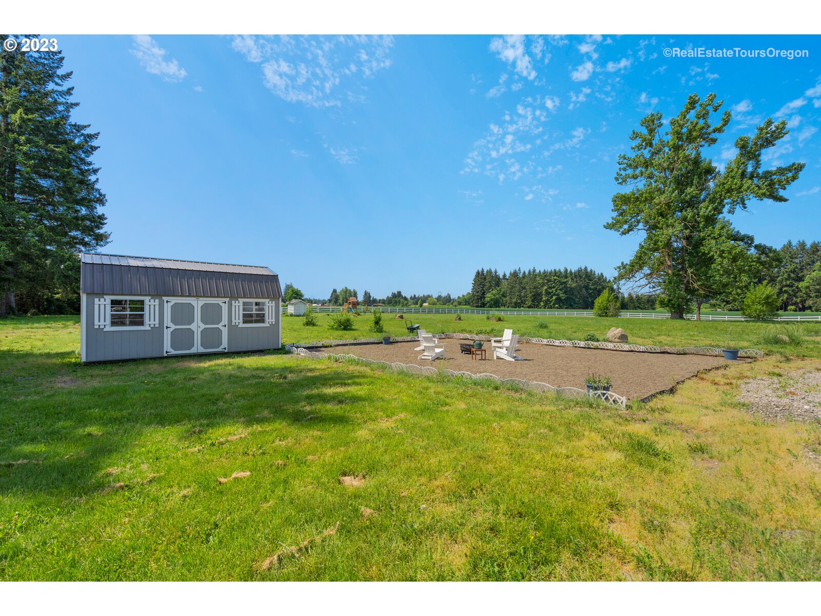 6970 South Knights Bridge Road Canby, OR 97013 - Photo 28 of 32 a view of a house with a yard