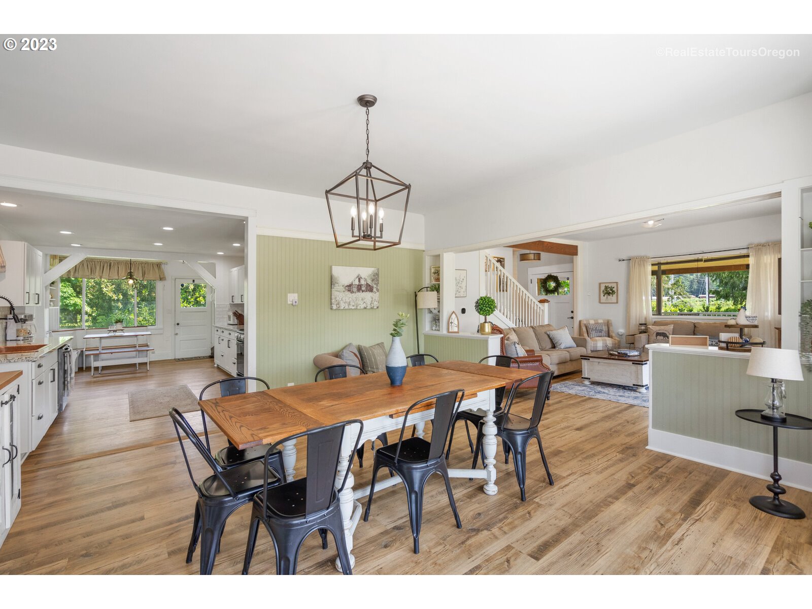 6970 South Knights Bridge Road Canby, OR 97013 - Photo 6 of 32 a view of a dining room with furniture window and wooden floor