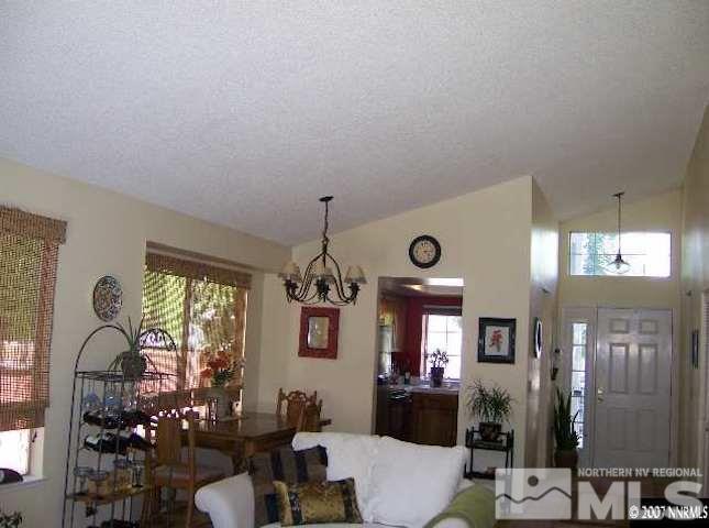4389 Pescado Way Reno, NV 89502 - Photo 2 of 9 a living room with furniture and a large window