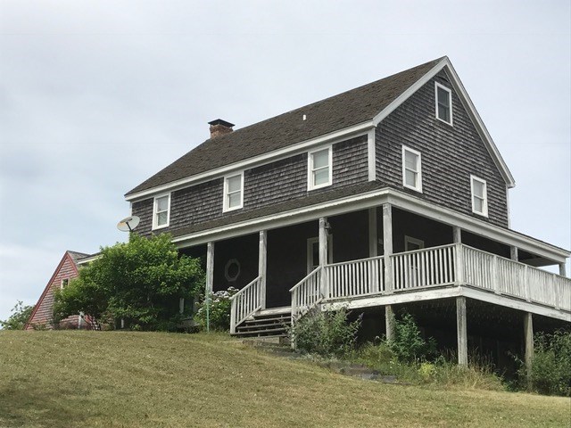812 Beacon Hill Road Block Island, RI 02807 - Photo 1 of 7 Colonial style exterior with decks and covered porch