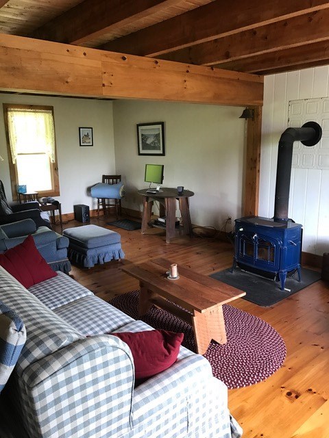 812 Beacon Hill Road Block Island, RI 02807 - Photo 4 of 7 Large living room with woodstove