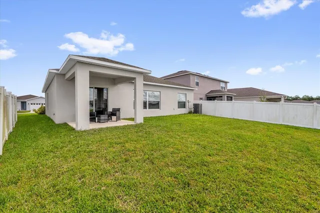 an aerial view of a house with garden