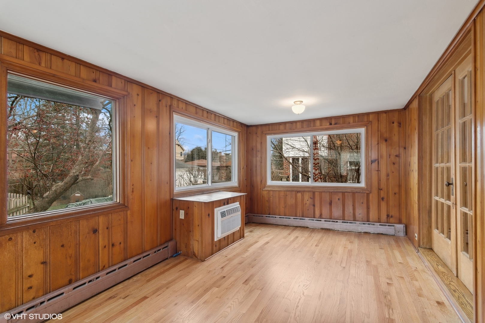 222 North Merrill Street Park Ridge, IL 60068 - Photo 9 of 20 an empty room with wooden floor and windows