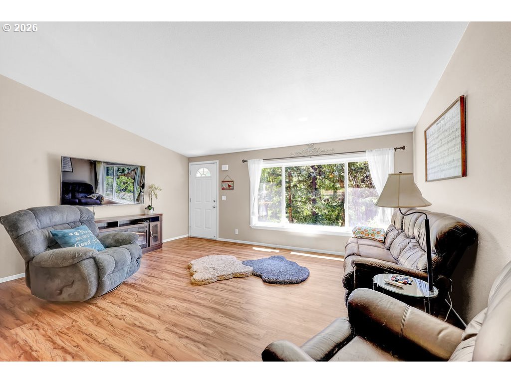 35235 Row River Road Cottage Grove, OR 97424 - Photo 18 of 28 a bedroom with furniture and a large window