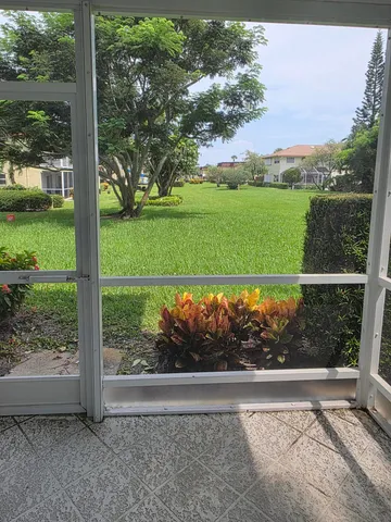 a view of a garden with a lake