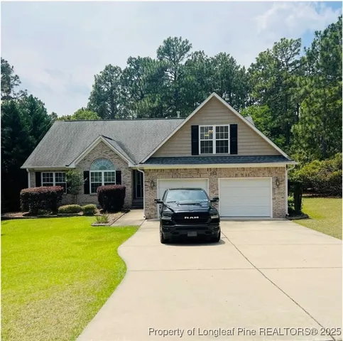 a house view with a garden space