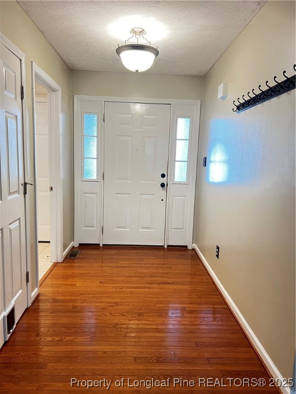208 Wood Run Sanford, NC 27332 - Photo 2 of 29 a view of an empty room with a window