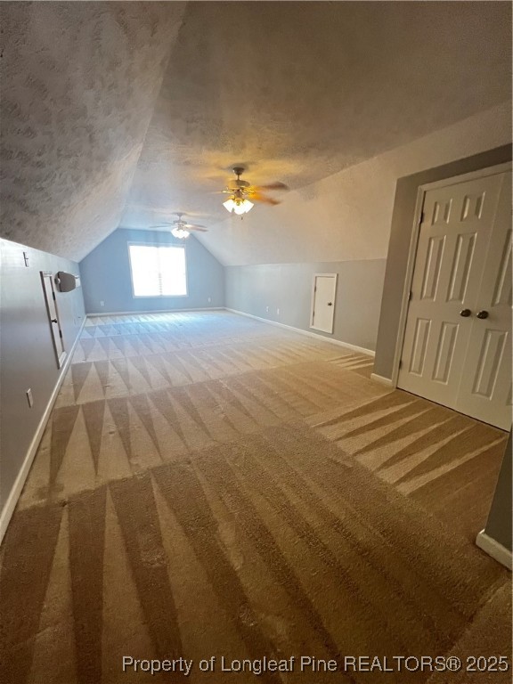 208 Wood Run Sanford, NC 27332 - Photo 21 of 29 a bedroom with a bed and a lamp with window