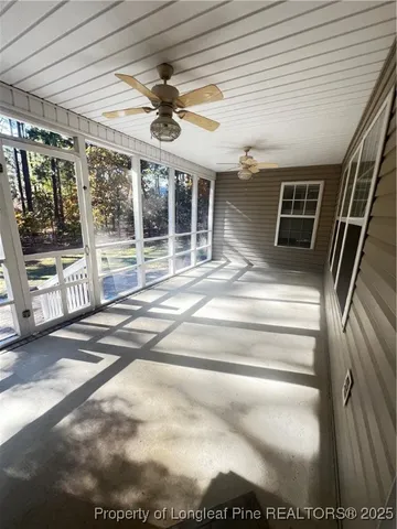 a view of a yard with swimming pool