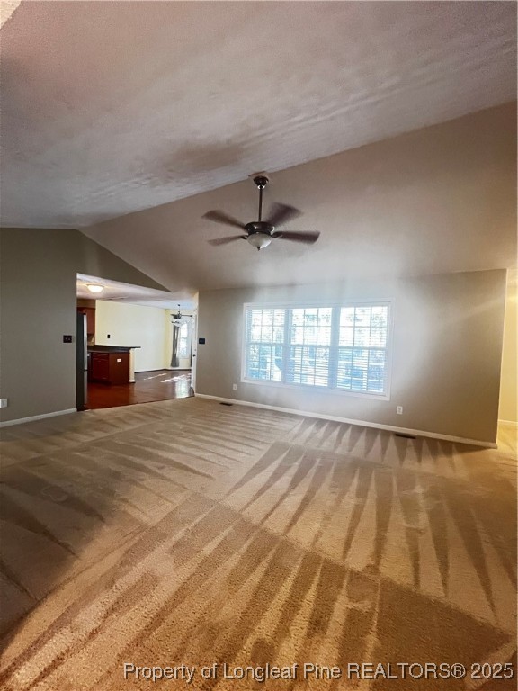 208 Wood Run Sanford, NC 27332 - Photo 3 of 29 a view of empty room with wooden floor and fan