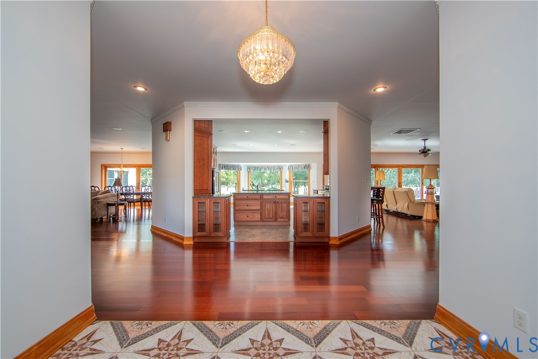 19220 Mink Farm Road Onancock, VA 23417 - Photo 3 of 50 a view of a dining room with furniture and wooden floor