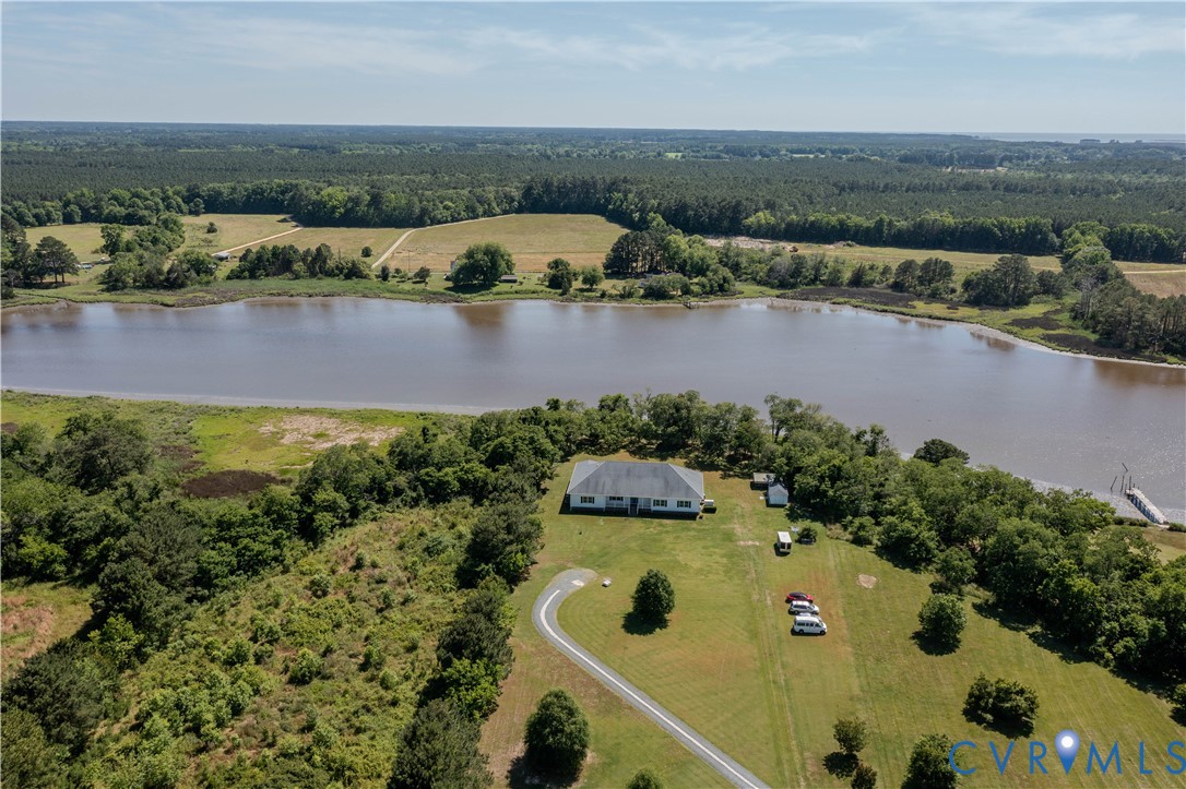 19220 Mink Farm Road Onancock, VA 23417 - Photo 50 of 50 an aerial view of a house with a lake view
