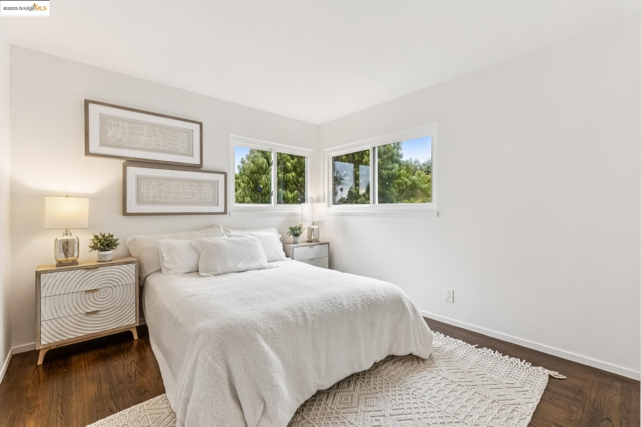 5619 Doremus Avenue Richmond, CA 94805 - Photo 14 of 45 a bedroom with a bed and a window