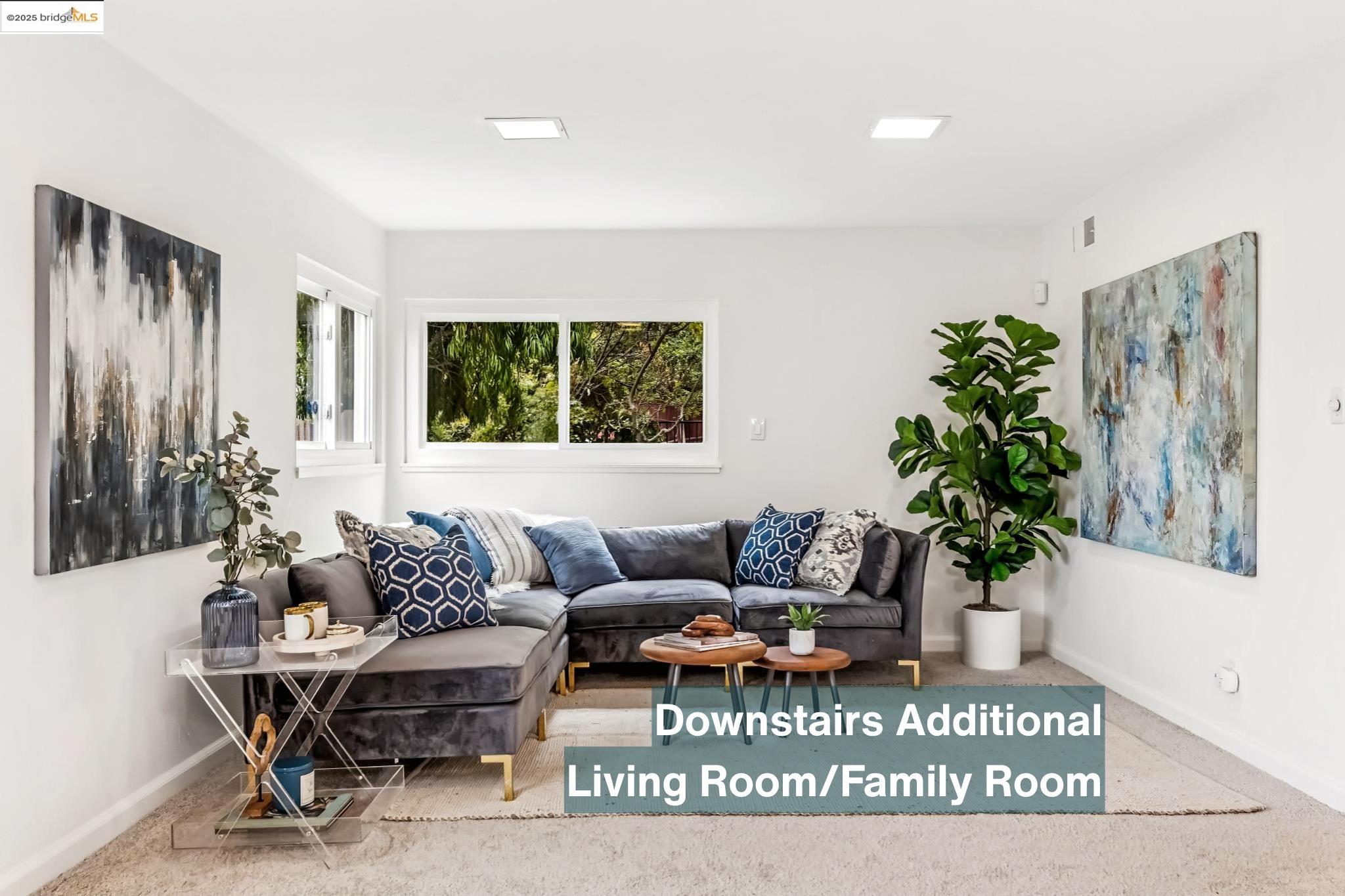 5619 Doremus Avenue Richmond, CA 94805 - Photo 23 of 45 a living room with furniture potted plant and a window
