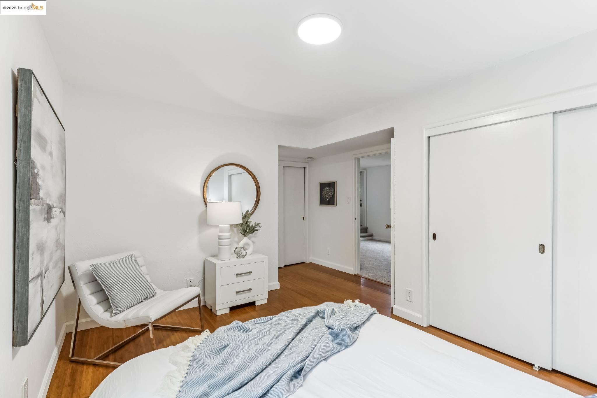 5619 Doremus Avenue Richmond, CA 94805 - Photo 27 of 45 a bedroom with a bed and a window