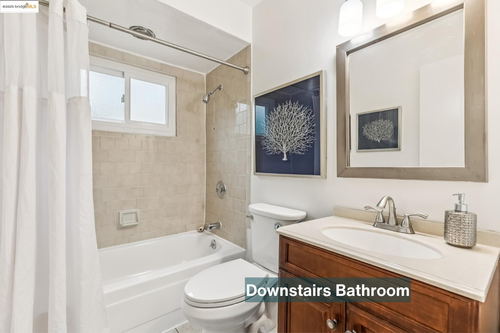 5619 Doremus Avenue Richmond, CA 94805 - Photo 28 of 45 a bathroom with a granite countertop sink toilet and shower