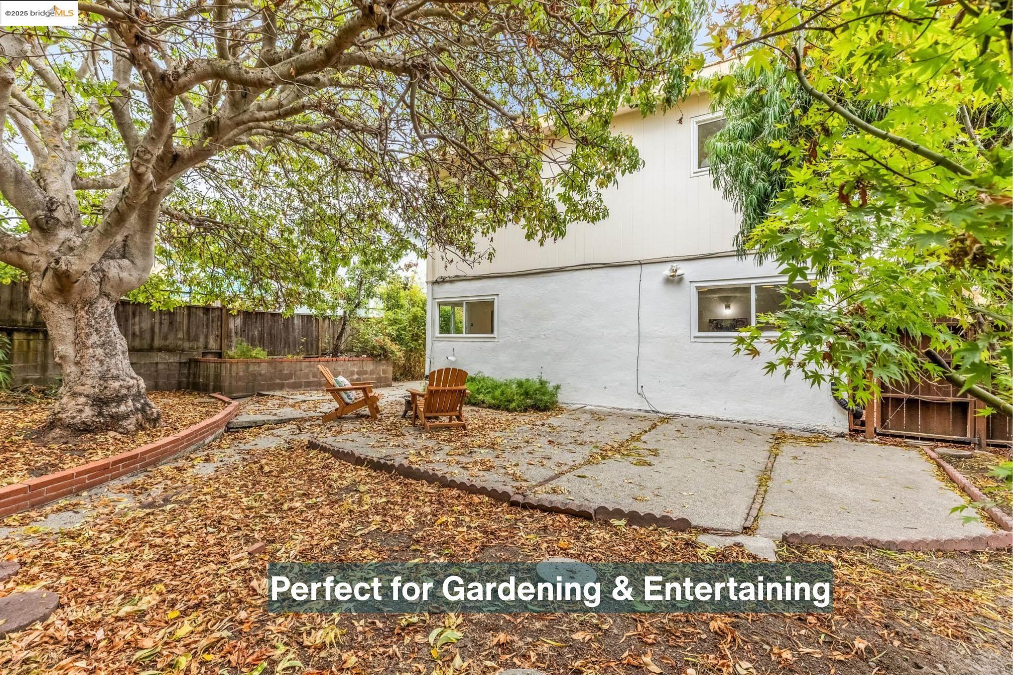 5619 Doremus Avenue Richmond, CA 94805 - Photo 34 of 45 a view of a backyard with a large tree