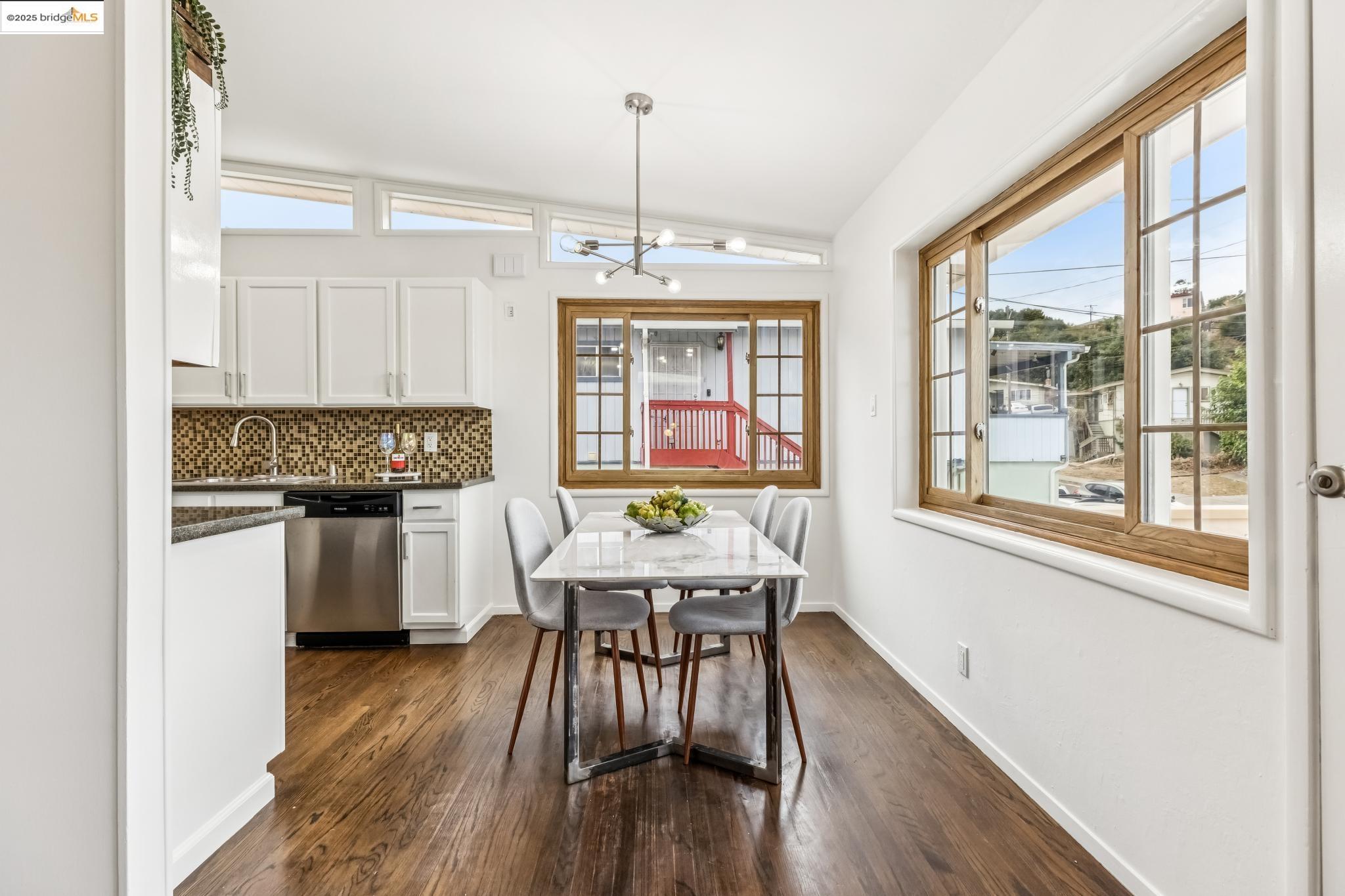5619 Doremus Avenue Richmond, CA 94805 - Photo 6 of 45 a living room with furniture and a wooden floor