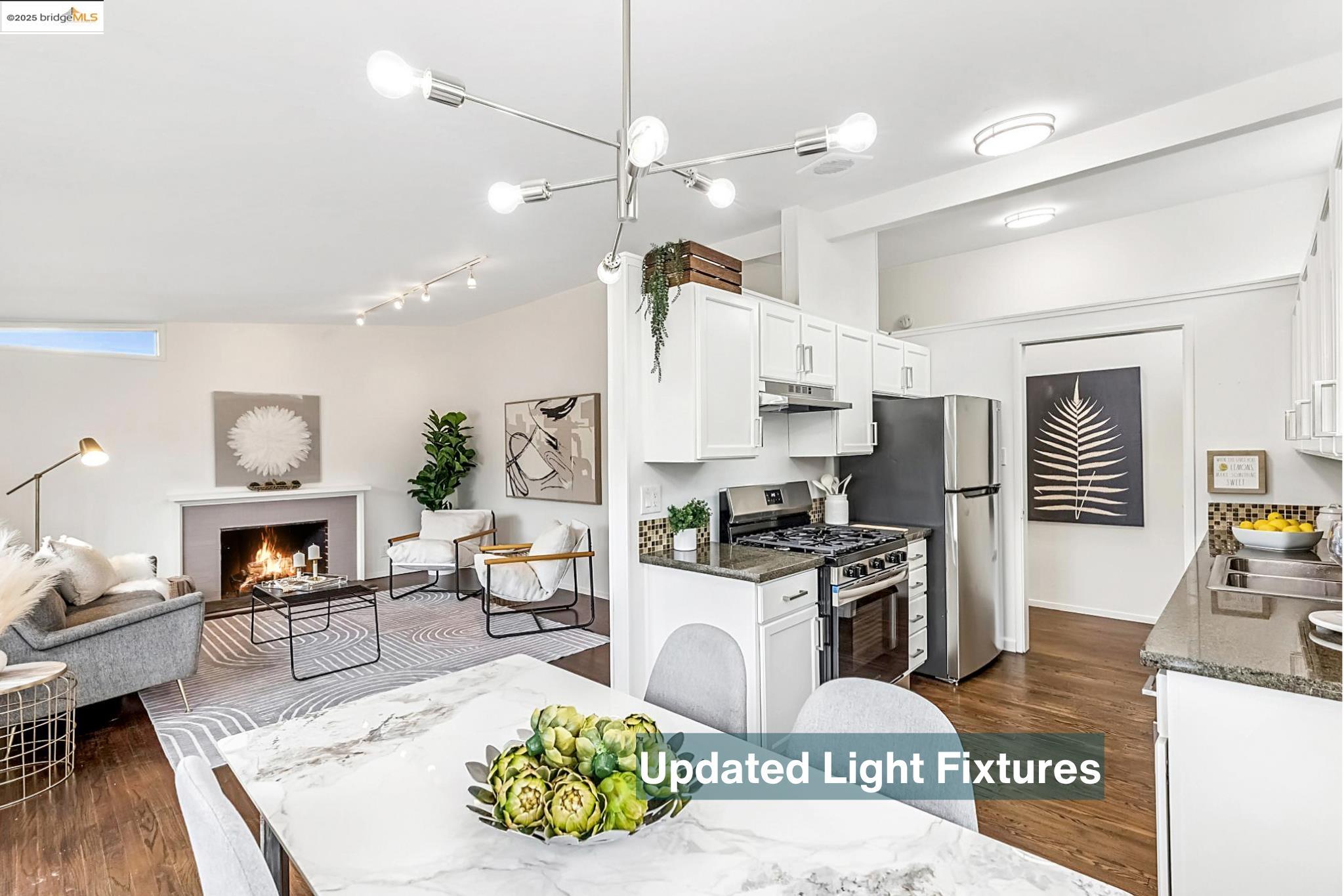 5619 Doremus Avenue Richmond, CA 94805 - Photo 45 of 45 a kitchen with a refrigerator a stove top oven a dining table and chairs with wooden floor