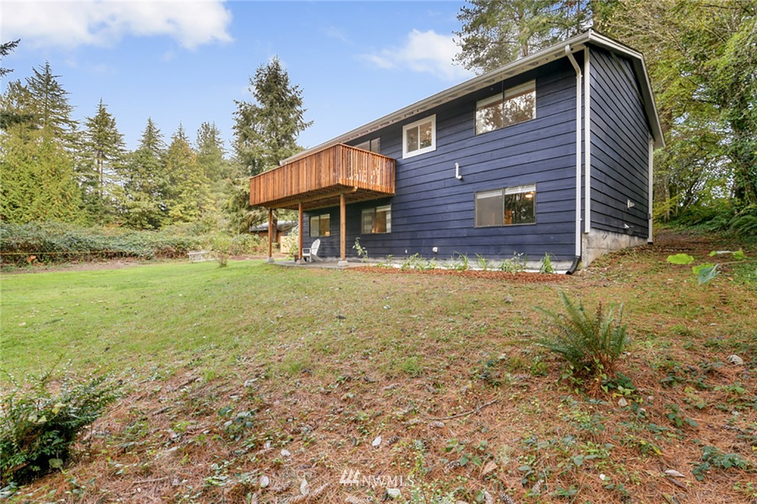 2507 Rocky Point Road Northwest Bremerton, WA 98312 - Photo 20 of 31 a view of a house with a yard