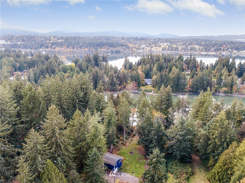 2507 Rocky Point Road Northwest Bremerton, WA 98312 - Photo 27 of 31 an aerial view of houses covered in trees